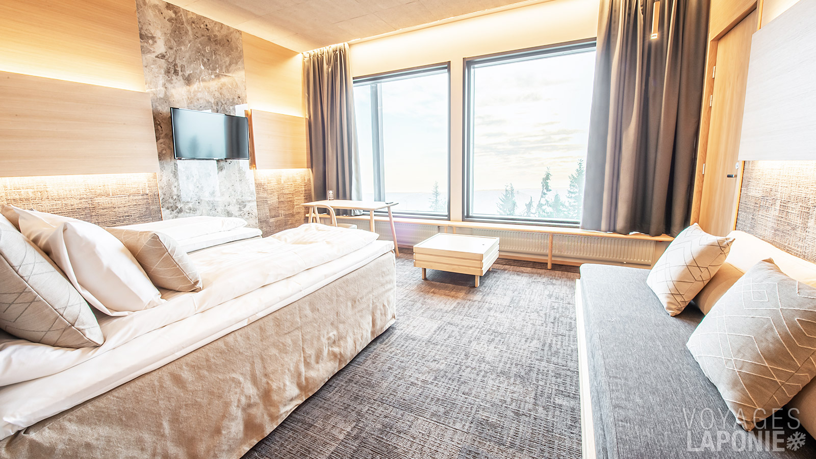 Les chambres Superior allient confort moderne et splendide vue sur les collines enneigées